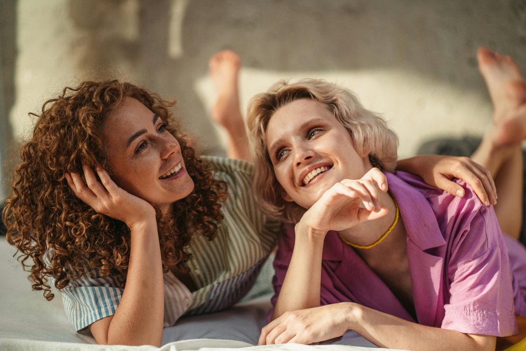Two women smiling and talking – therapy myths in 2026