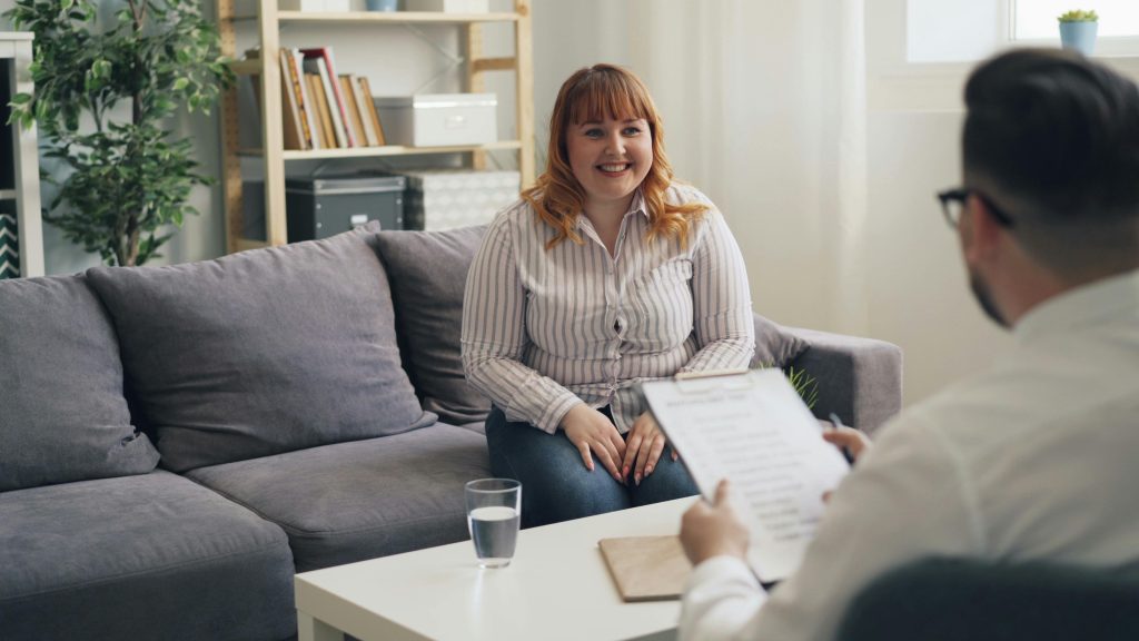 Woman speaking with therapist during an in-office counselling session