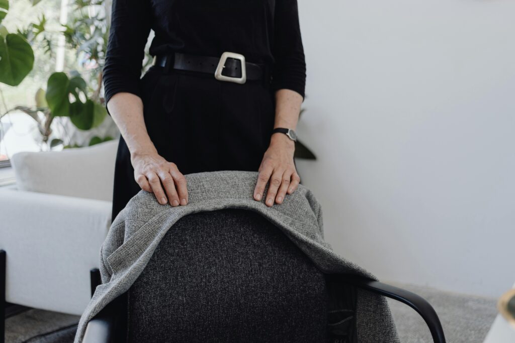Therapist preparing a counselling chair for a session about how often should you go to therapy